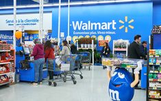 people are shopping in a walmart store