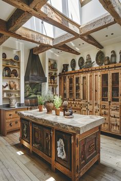 a large kitchen with wooden cabinets and an island