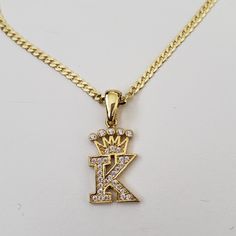 Yellow Gold Plate Sterling Silver Letter 'K' Crown Pendant Necklace Measures 18" Total Length Chain X 3mm Width; Pendant 1" Length Drop X 0.5" Width Chain Made In Italy Made In Turkey Initial Pendant Jewelry With Curb Chain For Gift, Gift Jewelry With Initial Pendant And Curb Chain, Necklace K, K Necklace, Crown Pendant Necklace, Crown Pendant, Initial Necklace Gold, Letter K, Neck Chain