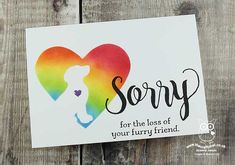 a card that says sorry for the loss of your furry friend with a dog's head painted on it