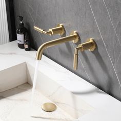 a faucet that is connected to a sink in a bathroom