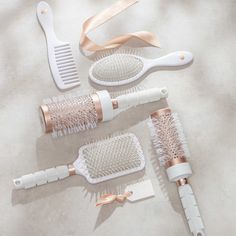 Never underestimate the power of a good hairbrush. The Ultimate Brush Set is a must-have staple for daily styling and touchups. You’ll use them. You’ll love them. You’ll thank us. The Ultimate Brush Set includes: T3 Smooth Paddle Brush, T3 Volume 2.5" Round Brush, T3 Volume 3" Round Brush, and T3 Detangle Duo: Wide tooth comb + Detangle brush. | T3 Pro Brush Collection Classic 5 Hairbrush Collection, White T3 Curling Iron, Detangle Brush, Curling Techniques, Hair Dryer Set, Hair Dryer Accessories, Rotating Curling Iron, Hair Diffuser, Barrel Curling Iron, Hair Brush Set