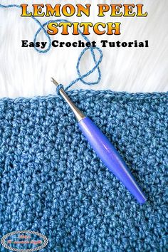 the crochet lemon peel stitch is next to a blue crochet hook