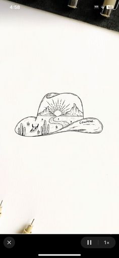 a drawing of a cowboy hat sitting on top of a sheet of paper