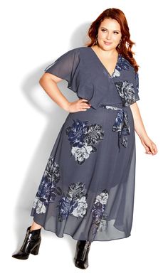 Simply perfect! The Bouquet Dress is a slate-tinted dream that wraps your curves perfectly and falls softly with a sheer overlay. Finished with a floral design and a self-tie detail to accentuate your curves, you'll be turning heads and melting hearts wherever you go in this dreamy piece. Key Features Include: - Faux-wrap V-neckline - Short, sheer sleeves - Sheer cape detail to back - Self-tie waist detail - Invisible back zip closure - Relaxed silhouette - Partially lined Style with kitten heel Plus Size Flowy Dress, Chic Bouquet, Plus Size Occasion Dresses, Sheer Cape, Bouquet Dress, Sukienki Plus Size, Sheer Overlay, Date Night Dresses, Plus Size Fashion For Women