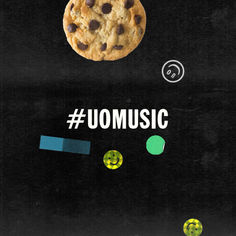 a cookie with the words uomusic on it and some circles around it