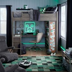 a room with a bunk bed, desk and chair