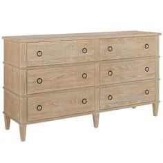 a wooden dresser with six drawers and four legs