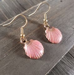 18k gold plated stainless steel handmade earrings with salmon pink seashells. Be sure to check out more HANDMADE jewelry in my shop, DizzleBees, beautiful jewelry of all kinds available! Made with quality materials and always nickel and lead free metals ♡ Perfect gift for a friend or loved one: All jewelry pieces are packaged in silver silk jewelry pouches, wrapped carefully, and packaged with love. Beautiful wrapping for gift ready giving. Personalized gift messages available. See Gift Wrapping Resin Beach, Nautical Earrings, Silk Jewelry, Seashell Earrings, Jewelry Pouches, Silver Silk, Earrings Summer, Summer Earrings, Gold And Pink