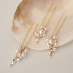 A romantic take on a classic - these beauties are adorned with graduated baroque freshwater and swarovski pearls. Add them to up-swept hair for a whimsical look. **This piece is a MADE TO ORDER piece and will ship between 2-3 weeks after purchase date** Measures approx. 4 inches at it's longest by approx. 1/2 inch at it's widest Materials: freshwater pearls, Swarovski pearls, anti-tarnish silver Available in silver or gold Finished on an open hair pin Handmads Christine Elizabeth Collection Hair Bobby Pins, Open Hairstyles, Tarnished Silver, Swarovski Pearls, Hair Pin, A Romantic, Wedding Shoes, Gold Finish, 3 Weeks