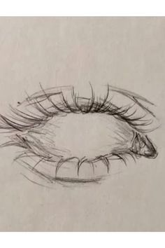 a drawing of an eye with long lashes