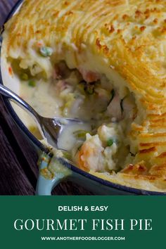 a close up of a casserole dish with a spoon in it and the words delish & easy gourmet fish pie