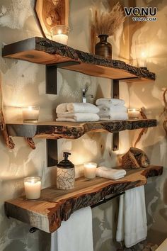 Rustic bathroom shelves made from natural live-edge wood, adorned with towels, candles, and decorative items, creating a warm and cozy atmosphere. Bathroom Rustic Shelves, Diy Wood Bathroom Decor, Wood Bathroom Aesthetic, Log Shelves Rustic, Small Bathroom Ideas Natural Wood, Hunters Bathroom Ideas, Earthy Themed Bathroom, Alpine Home Decor, Unique Bathroom Shelves