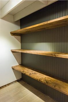 empty wooden shelves in an empty room