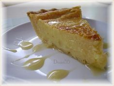 a piece of pie sitting on top of a white plate