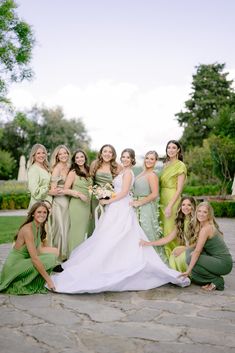 a group of bridesmaids posing for a photo