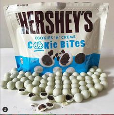 there is a bag of cookies in the middle of some white eggs and chocolate chips