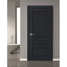 a black door in a white room