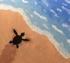 a painting of a turtle on the beach