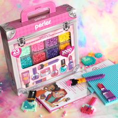 the perler kit is packed with beads and other crafting supplies for kids to make