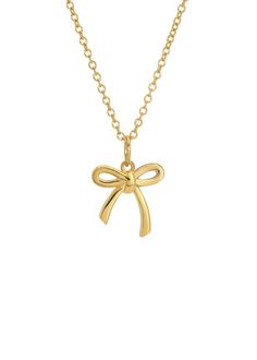 A charming, slim bow charm (12 mm) adds a touch of sweetness to this 14K gold plated brass adjustable necklace. 14K Gold plated brass. 16-18" length. Slim bow charm. Chic Ribbon Necklace Perfect For Gifts, Chic Ribbon Necklace For Gift, Gold Necklace With Ribbon For Gift, Gold Necklace With Ribbon Perfect For Gifts, Chic Gold Necklace With Bow, Cute Necklaces Gold, Gold Bow Necklaces For Gifts, Gold Necklaces With Bow For Gifts, Gold Necklaces With Bow As Gifts