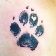 an animal's paw print on the chest with hearts in the center and heart - shaped holes at the bottom