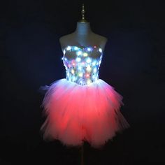 This LED fairy dress is a complete look on its own. Quality made and ready for any festival or performance. It's been beta tested and she is ready to hit the streets and dance the night away.  Don't hit the playa without one of these! Burningman Coachella go anywhere and glow to your hearts content, takes 12 AA batteries (not provided)  The back adjusts like a corset so it fits you like a dream, also a zipper on the skirt so it's easy to get on and off. Please allow up to 6 weeks lead time as garments take time to complete.  No returns for ordering wrong size, 30 day return policy only if product is malfunctioning due to supplier error. So take your measurements! Fairy Style Party Dress, Fitted Fantasy Fairy Dress For Party, White Party Festival Dresses, White Party Dress For Festivals, White Fairy Party Dress, White Fairy Dress For Party, White Fairy Style Party Dress, White Fairytale Fairy Dress For Parties, Fitted Fairy Dress For Halloween Party