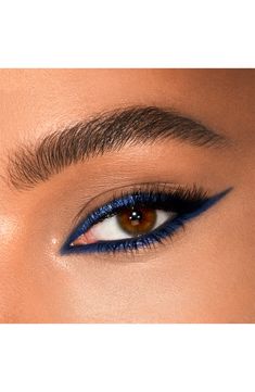 What it is: A limited-edition matte and metallic duo eyeliner pencil to emphasize and amplify your eye color. What it does: The pigmented shades are infused with emollient oils and natural waxes to provide an easy glide and gel-like application. The long-wearing waterproof liner lasts for up to 16 hours to take you from day to night. To choose your perfect shade, select the hue opposite from your iris' natural color to ignite your eyes and make them pop.How to use: Use the matte shade along the Blue Kajal Eyes, Blue Eye Shadow Looks, Fancy Makeup Looks, Grafik Eyeliner, Dark Blue Makeup, Eyeliner Bleu, Make Up Eyes, Colour Magic, Prom Eyes