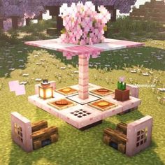 an image of a table with food on it in the middle of a grass field