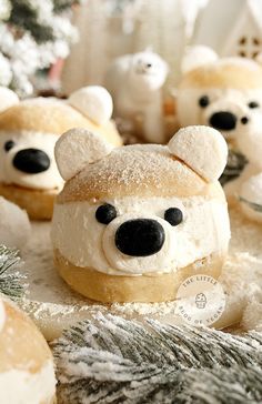 some teddy bears made out of doughnuts and frosted with white icing