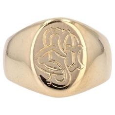 Ring in 18 karat yellow gold, own hallmark. Antique massive signet ring, it presents on its top an oval plate, engraved with the initials "PS", the ring being broad and bulging on the departure and on all the body of the ring. Height : 14 mm, width : 11.2 mm, thickness : 2.7 mm, width of the ring at the base : 5 mm. Total weight of the jewel : 12,2 mm. US Size : 5,75 ; Free resize, please contact us. Authentic antique jewel - French work from the XXth century. Our opinion : An antiqur signet rin Oval Plate, Engraving Fonts, Engraved Initials, Gold Engraving, Cartier Ring, Vintage Cartier Bracelet, Dior Ring, Engraved Rings, Signet Ring