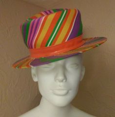 Joseph Horne Co. Millinery Orange/Multi Color Fedora Hat true vintage - 1960's Mod - GoGo! this HAT makes the outfit... wear it today with your bell bottoms or mini skirt.....go'in to a GO GO!!! Condition:  vintage very good++ Size:  Small Color:  Orange/Gold/Pink/Purple/Green/White Pattern:  Striped Material:  Fabric/Plastic Measurements: 4" crown 2 1/4" brim 20" circumference 1" orange band Description: Women's fedora  Brim is wider on sides Striped body Orange plastic band (8) rows of green s Fedora Hat Pattern, Creative Hats, Fandom Aesthetic, Colorful Hat, Womens Fedora, Fedora Hat, Orange Gold, Color Stripes, Hat Making