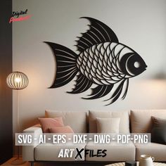 a living room with a white couch and black fish wall decal on the wall