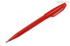 a red pen on a white background