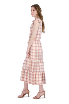 Created for spending days working from walks in the park, this gorgeous tiered dress featuring a stunning plaid print display and above the ankle length, is relaxed and flowy fit style with ruffled cap sleeves, a round neckline with a functional string tie, an adjusted waist tie, and an A-line tiered skirt.