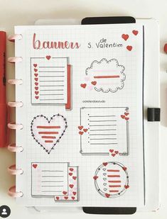 an open planner with hearts and other items