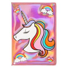 a pink wallet with a rainbow unicorn on it's face and clouds in the background