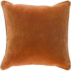 a brown pillow on a white background