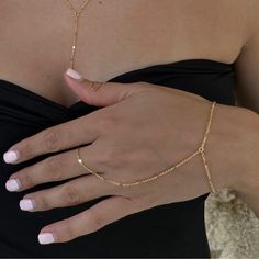 Dainty 18k gold plated/platinum plated hand chain. Our hand chain is so flattering and comfortable to wear. Our chain is sparkly and sits so beautifully on the hand. Layer with some of your favourite rings and bracelets. We have always been obsessed with hand chains so we created our own. Hand chains are so dainty and give that extra sparkle and shine to your hands. Measurements:  Bracelet - 6.5-7" inches (comes with extra adjustable 2" chain extender) Wrist to finger - 7 cm Please feel free to Permanent Hand Chain, Bracelet With Ring Attached Hand Chain, Finger Bracelet Gold, Bracelet Ring Chain, Gold Hand Chain, Bracelet With Ring, Hand Jewelry Rings, Hand Chain Jewelry, Finger Bracelets