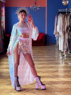 Dance reflecting all colors in Holographic UTIN Sparkly Robe for Women with white iridescent mermaid sequins🥳🍭 🎉Wear this for Parties, Festivals, Carnival, Night outs, Bachelorette, Pride, Halloween, Christmas, New Years Eve... ⚡️💥Want 3 days fast shipping? There is an option at the check out!☄️ 🥳Must have for your festival wardrobe. ☮️Colorful Shiny Sequins can be styled with any color you want to wear! 🎨Custom made tailoring for men & women in selected standard size  🍭Unique / One of a Kind 🪅Exclusive Tailoring 🏳️🌈Loose fit - extra comfortable - light - easy  🧬White Tulle fabric Base breaths Fairy Festival Outfit, Mermay Inspiration, Mermaid Top Costume, Rave Wedding, Holographic Rave Outfit, Tomorrowland Outfit, Rave Outfits Women, Edm Festival Outfit, Festival Outfits Rave