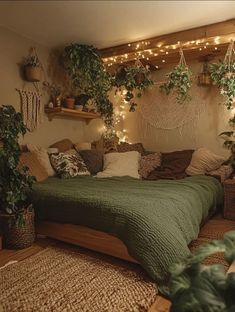 a bedroom with plants and lights on the wall