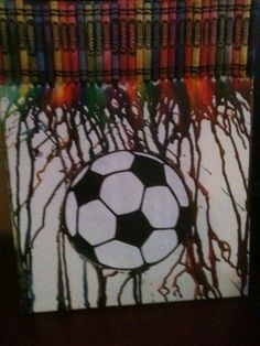 a painting of a soccer ball in the middle of bookshelves with trees painted on it