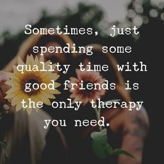 someone holding a sunflower with the words sometimes, just spending some quality time with god friends is the only therapy you need