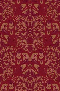 a red and brown wallpaper with an intricate design on it's surface,