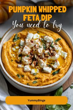 pumpkin whipped feta dip in a white bowl