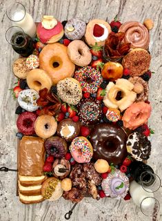 there are many different donuts on the table