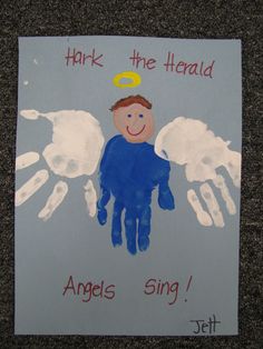 an angel handprint on a piece of paper with the words, mark the halo angels sing