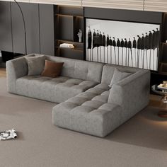 a living room with a large gray couch