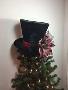 a christmas tree with a top hat on it