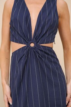 Polish up your wardrobe with a chic look like the Lulus Confident Season Navy Striped Linen Cutout O-Ring Mini Dress! Lightweight linen-blend fabric boasts a chic striped design as it shapes a sleeveless bodice with a plunging V-neckline and a darted bust. O-ring detail lends a flattering gathered effect to the waist, paired with a long cutout that wraps from back to front. Skirt has a figure-skimming effect and ends at a mini hem. Hidden zipper at side of top, hidden zipper/clasp at side of ski Dress Linen, Striped Mini Dress, Striped Linen, Navy Stripes, Dress 100, Large Size Dresses, O Ring, Stripes Design, Hidden Zipper